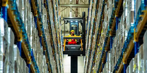 Warehouse worker Raben on a forklift 