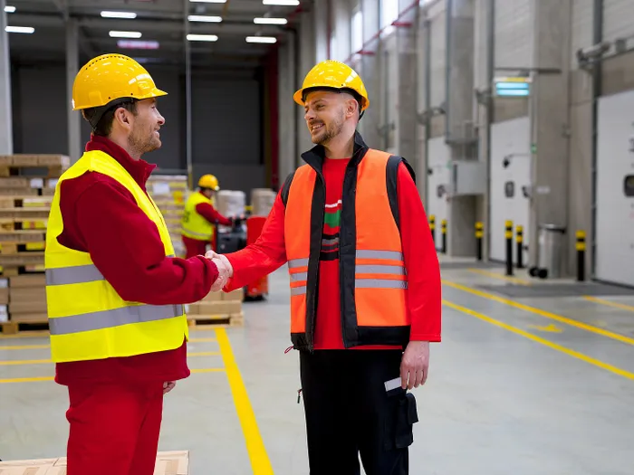 Two employees in the warehouse