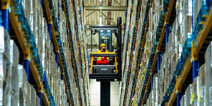 Raben warehouse worker on a forklift 