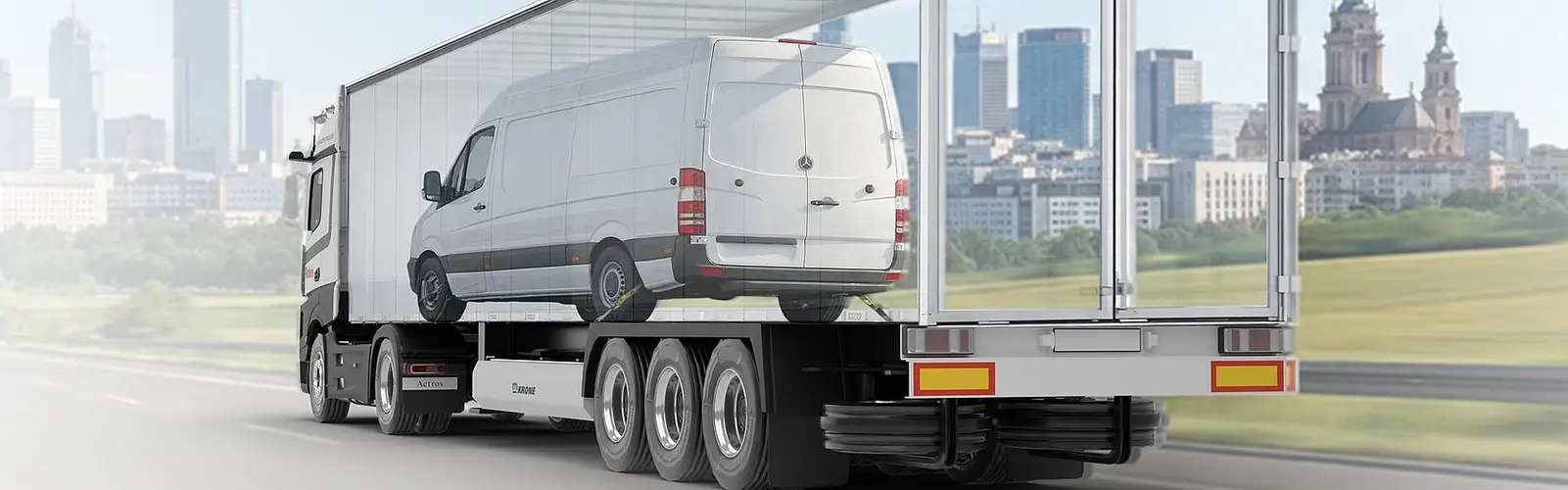 Camion Raben transportă un van